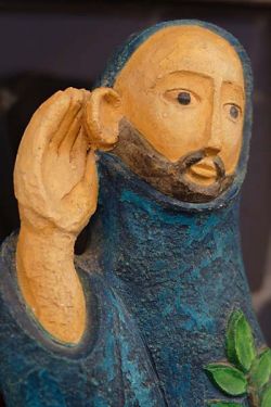 listening monk, polychrome plaster statue